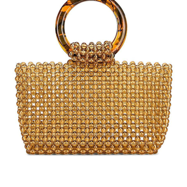 The incredible shrinking handbag: These trendy micro-purses are so tiny,  they're more like jewelry - Atlanta Magazine
